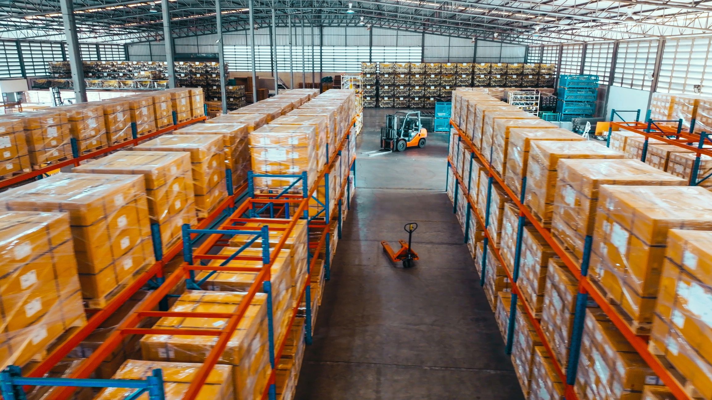 Organized warehouse storage racks with packaged inventory