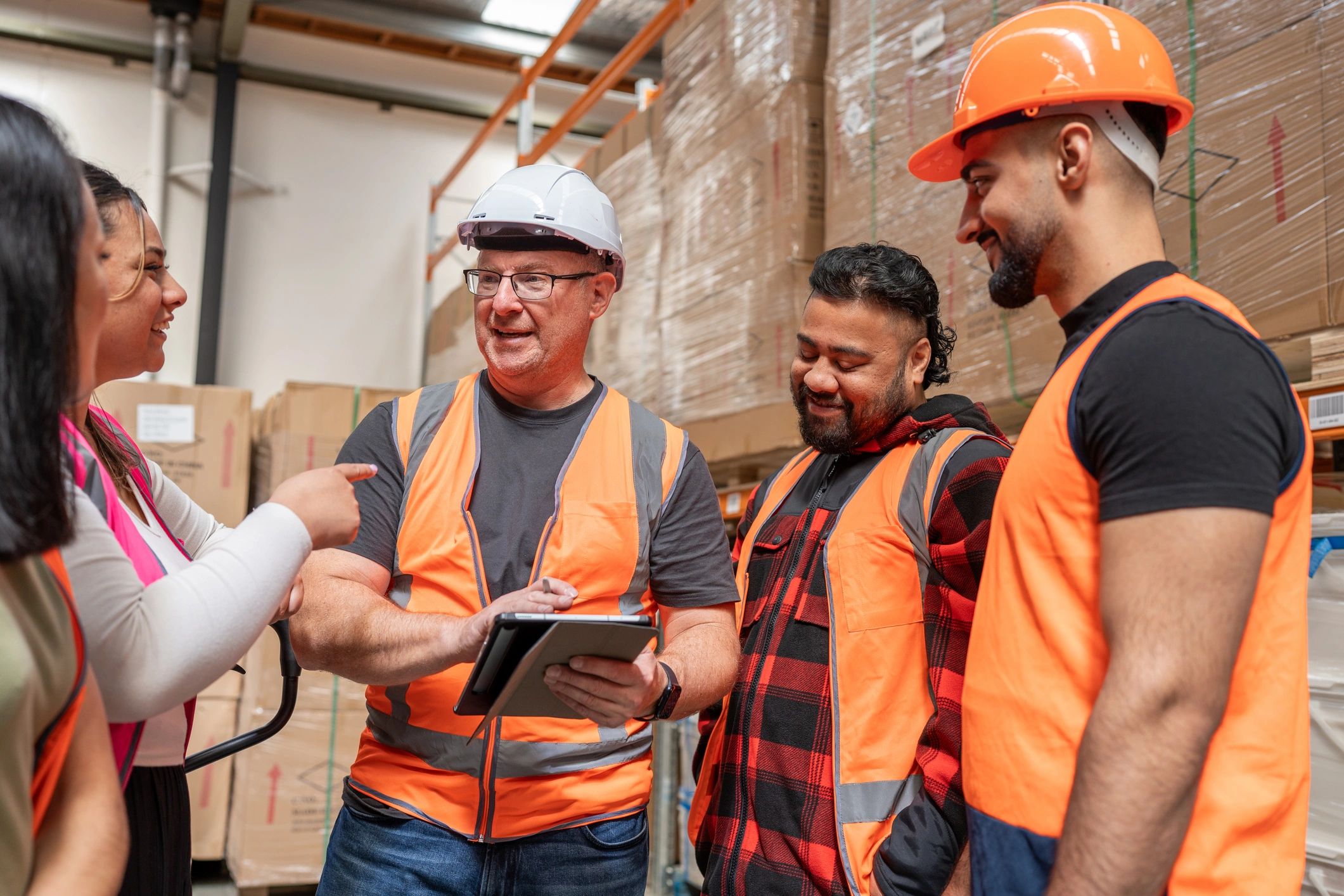 Logistics team reviewing warehouse operations